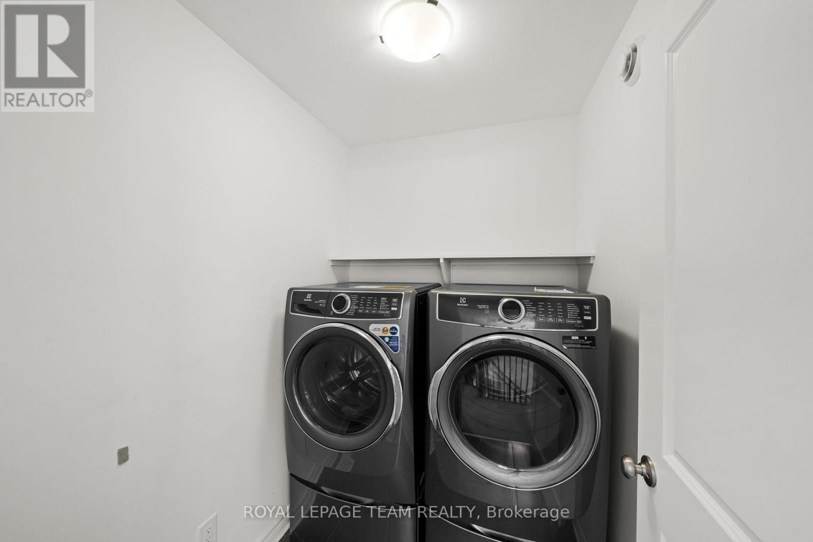 Convenient Second Floor Laundry Room - 41 Whooping Crane Ridge, Ottawa, ON