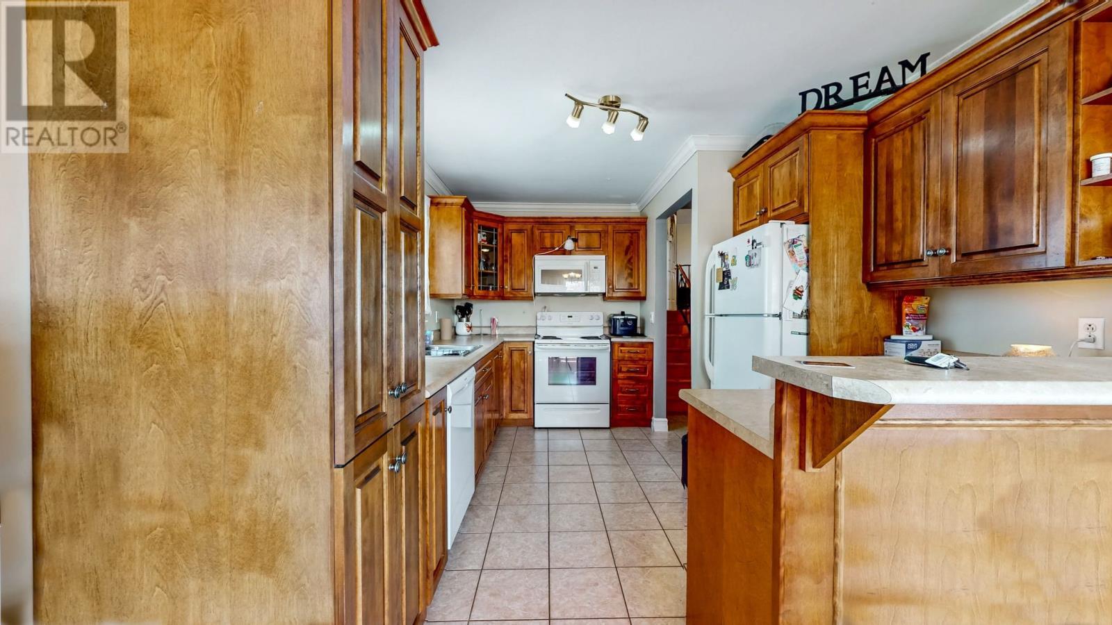 Kitchen from dining - 52 Canada Drive, St. John'S, NL
