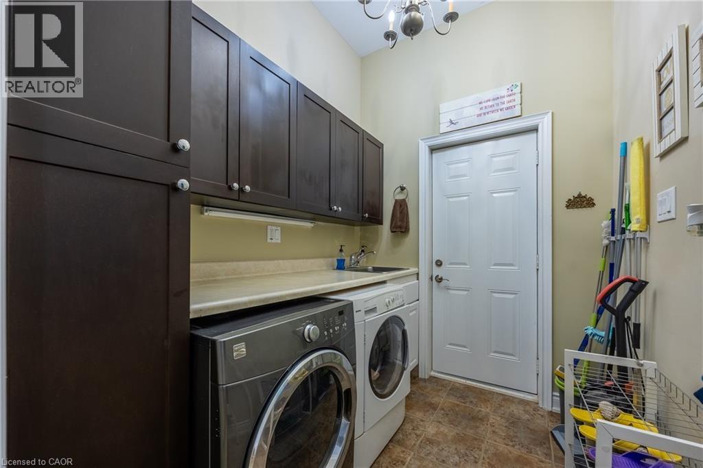 Laundry and entrance to double car garage - 21 Kelly Drive, Port Dover, ON