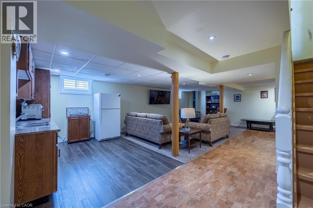 Basement family room with wet-bar/kitchenette - 21 Kelly Drive, Port Dover, ON