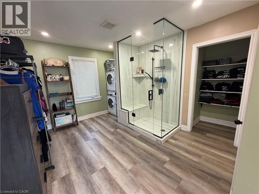 Dressing room with shower, closets and laundry - 94 Howard Avenue, Hamilton, ON