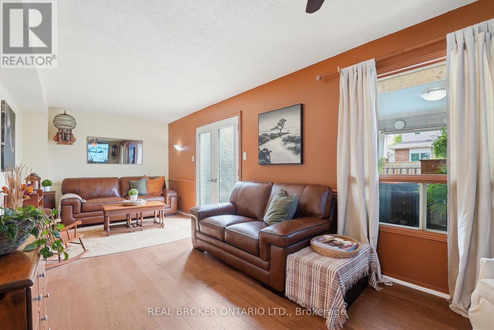Living Room with french doors to deck - 3260 Woodcroft Crescent, Burlington, ON