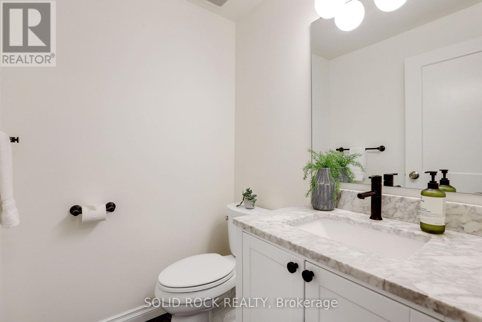 Updated powder room on main level - 97 Beachview Private, Ottawa, ON