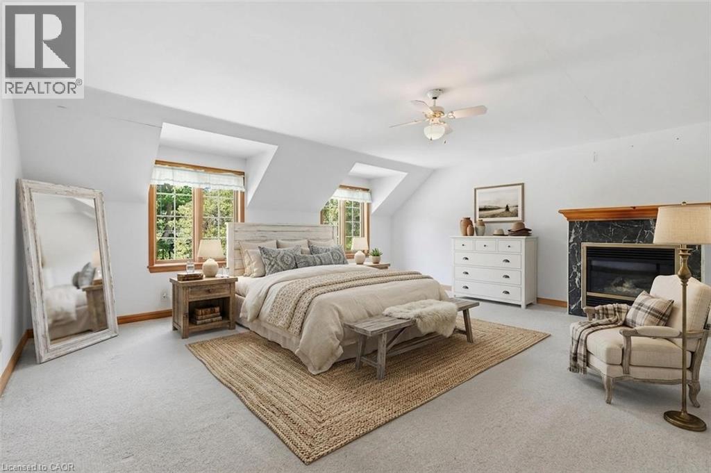 3 Ancaster Street E, Dundas, ON - Indoor Photo Showing Bedroom With Fireplace