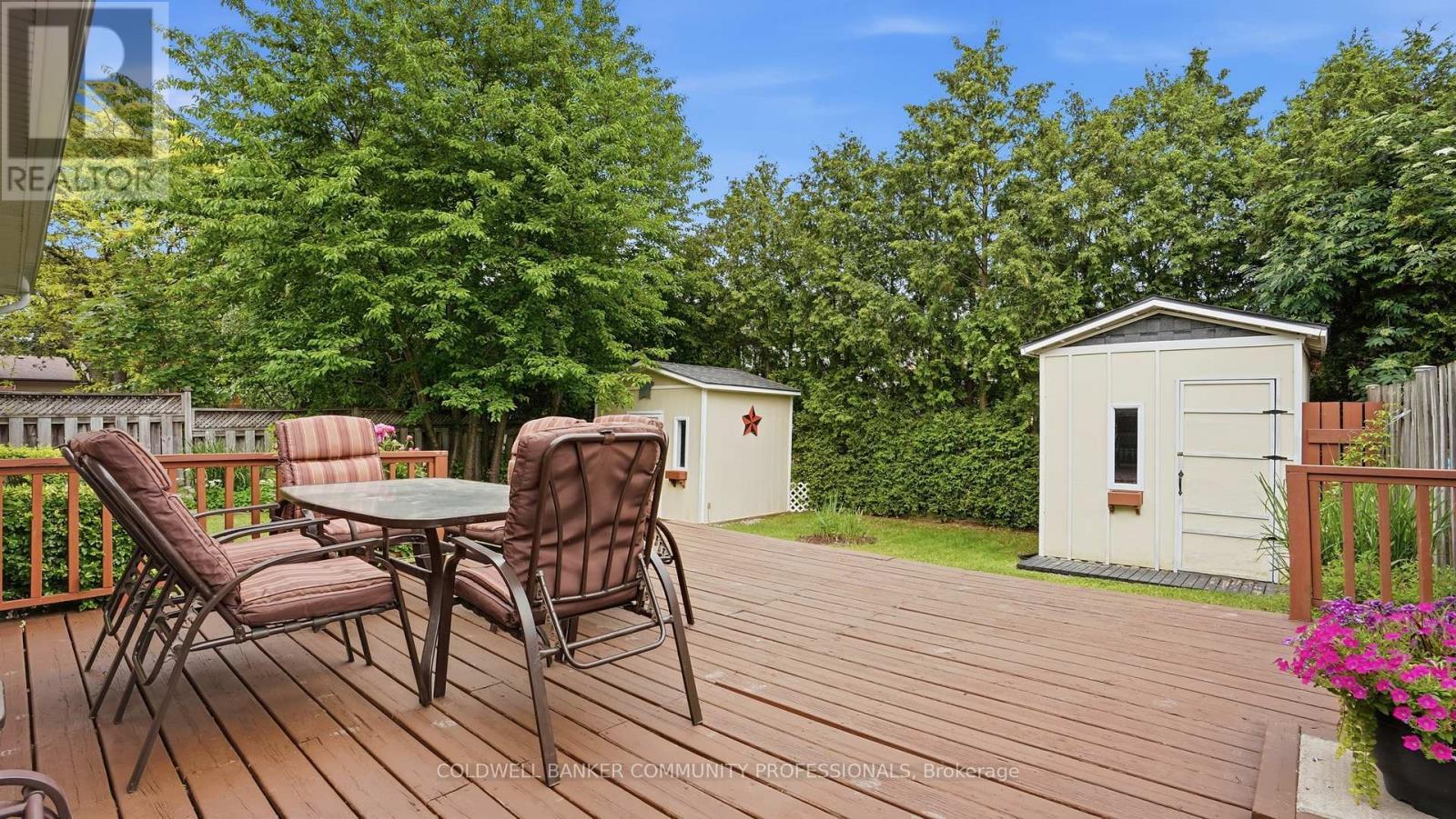 private yard with deck and sheds - 61 San Pedro Drive, Hamilton, ON