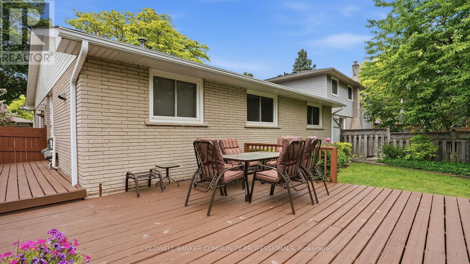 private yard with deck and sheds - 61 San Pedro Drive, Hamilton, ON