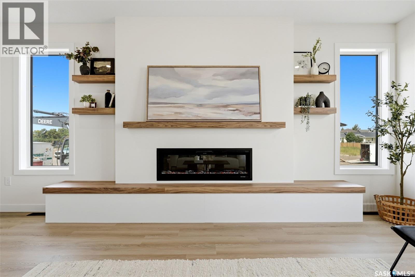 55 Country Road, Lumsden, SK - Indoor Photo Showing Living Room With Fireplace