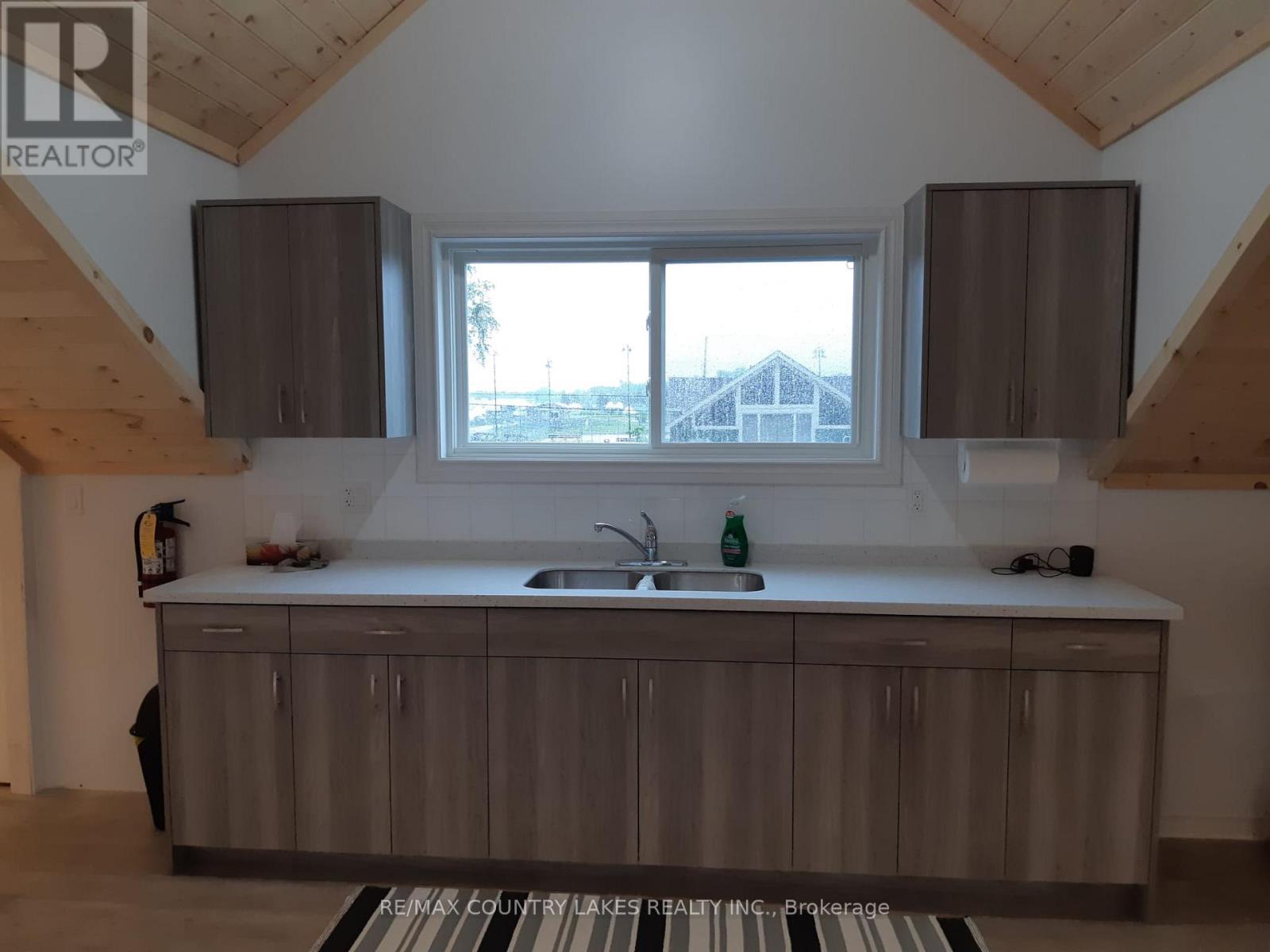 Kitchen in the 2 bedroom over garage - 3232 Simcoe Road, Ramara, ON