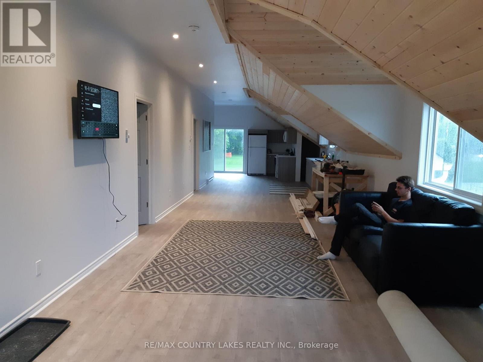 Living Area in 2 Bedroom Over Garage - 3232 Simcoe Road, Ramara, ON