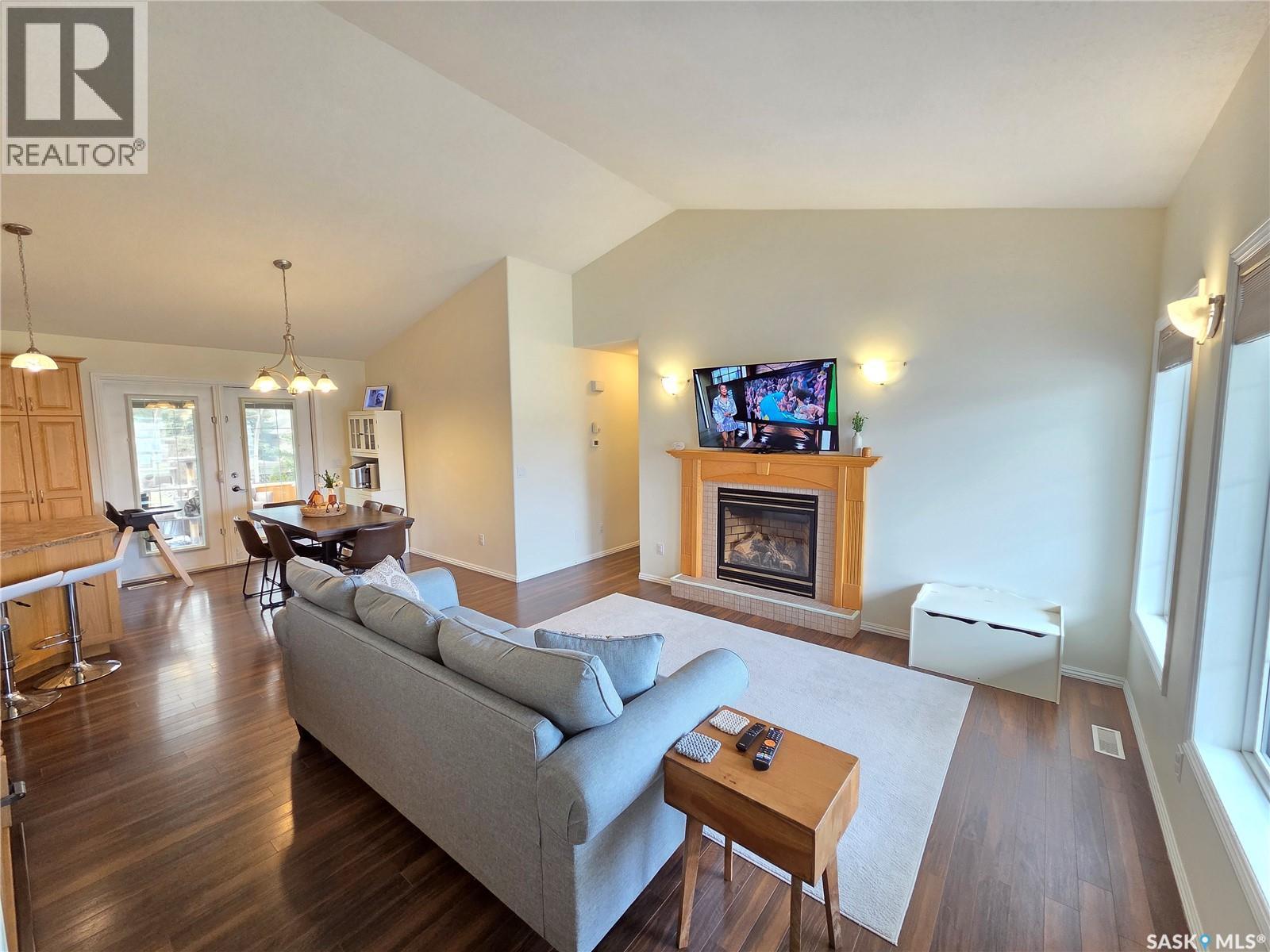 12 Arcola Place, Carlyle, SK - Indoor Photo Showing Living Room With Fireplace