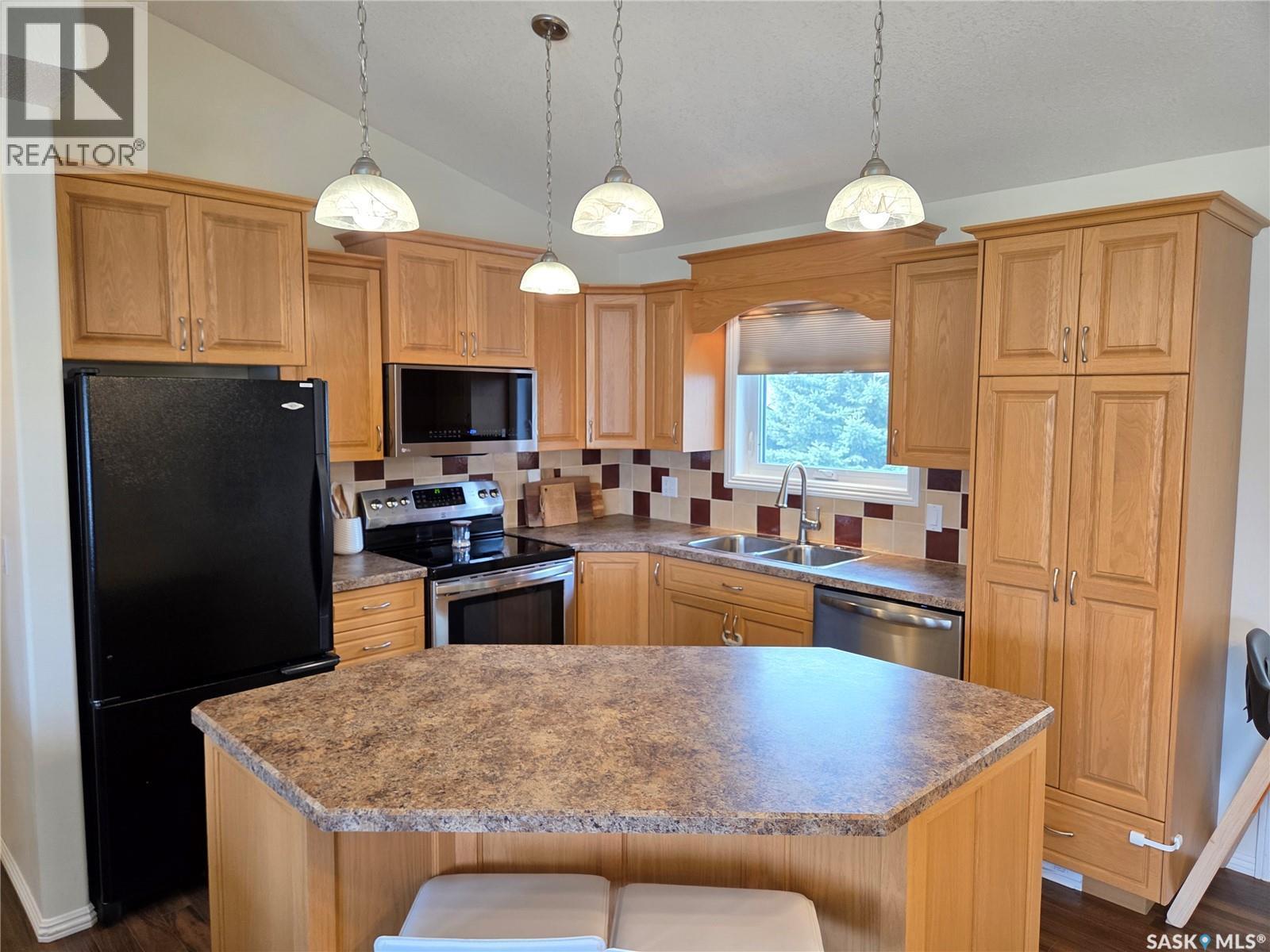 12 Arcola Place, Carlyle, SK - Indoor Photo Showing Kitchen With Double Sink