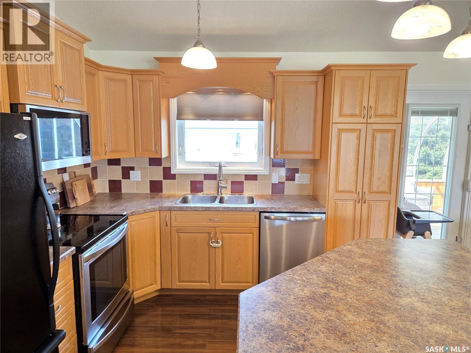 12 Arcola Place, Carlyle, SK - Indoor Photo Showing Kitchen With Double Sink