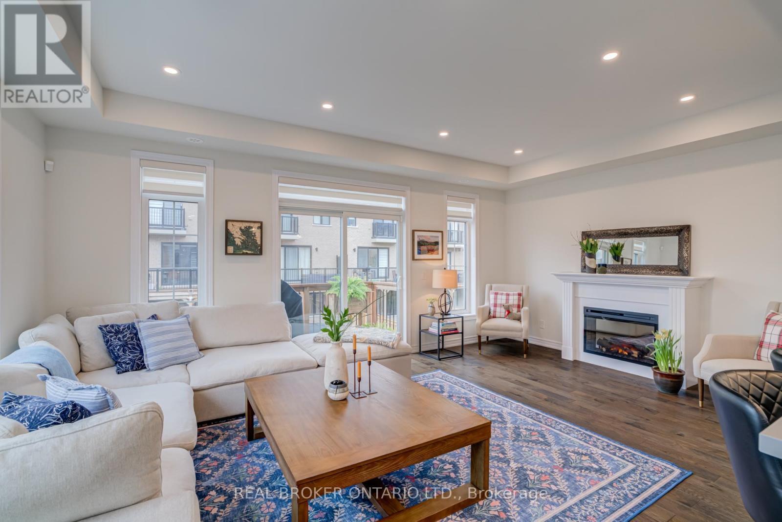 12 Icemaker Way, Whitby, ON - Indoor Photo Showing Living Room With Fireplace