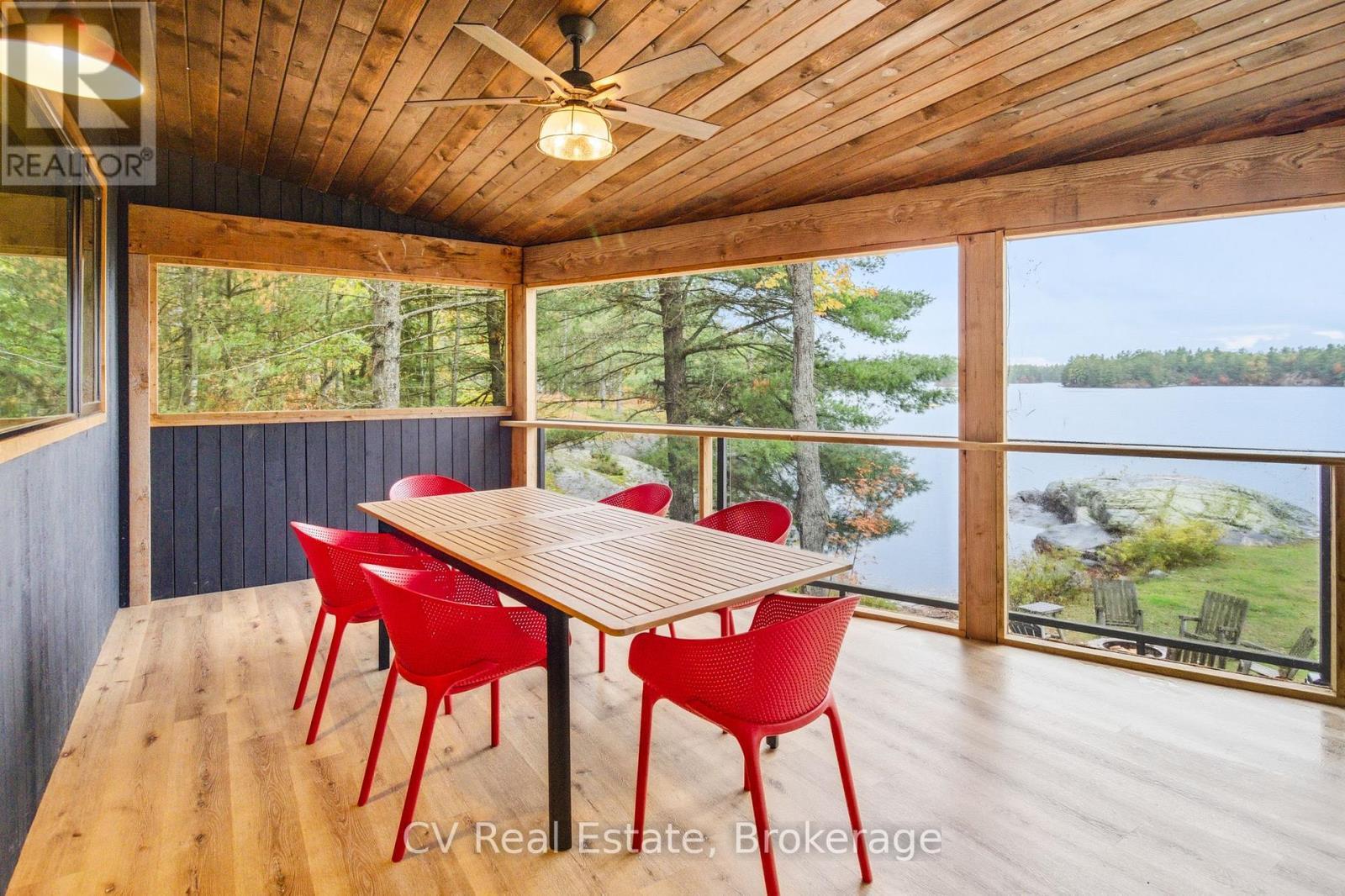 1069 White Eagle Road, Gravenhurst (Morrison), ON - Outdoor With Body Of Water With Deck Patio Veranda With Exterior