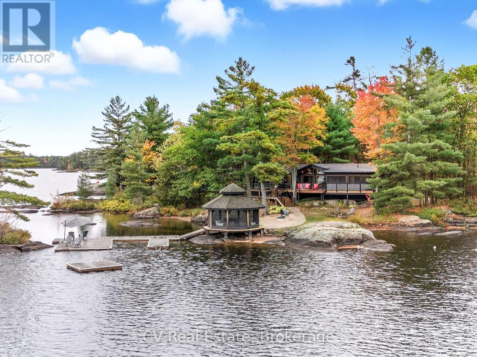 1069 White Eagle Road, Gravenhurst (Morrison), ON - Outdoor With Body Of Water