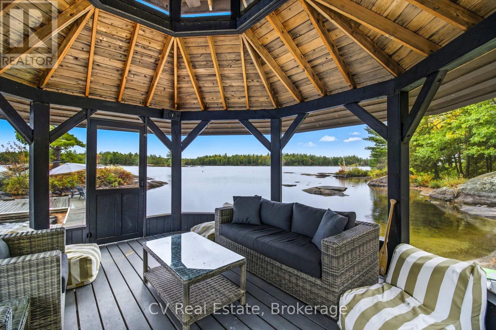 1069 White Eagle Road, Gravenhurst (Morrison), ON - Outdoor With Body Of Water With Deck Patio Veranda