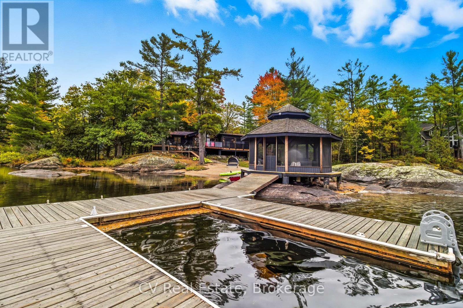 1069 White Eagle Road, Gravenhurst (Morrison), ON - Outdoor With Body Of Water With Deck Patio Veranda