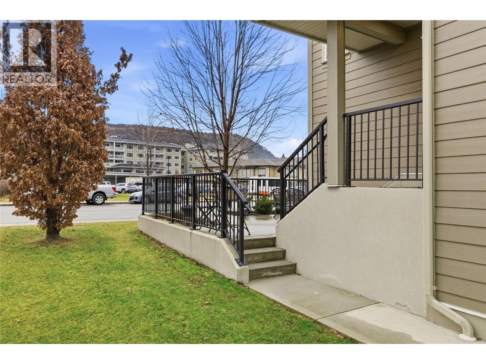 leads to side garage entrance - 300 Drysdale Boulevard Unit# 10, Kelowna, BC - Outdoor With Deck Patio Veranda