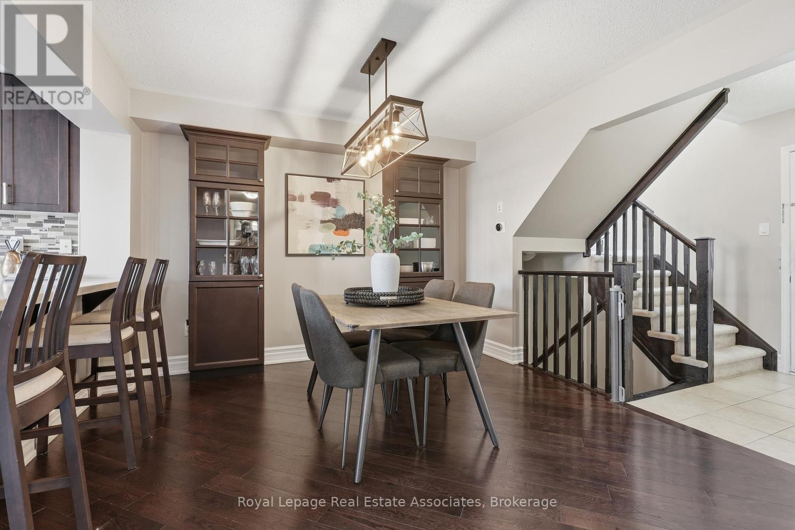 Hardwood Flooring - 362 Cavanagh Lane, Milton, ON - Indoor Photo Showing Dining Room