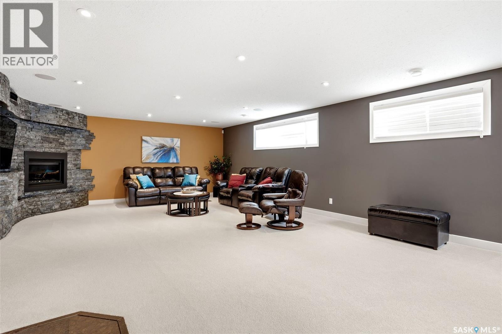 2539 Linner Way, Regina, SK - Indoor Photo Showing Basement With Fireplace