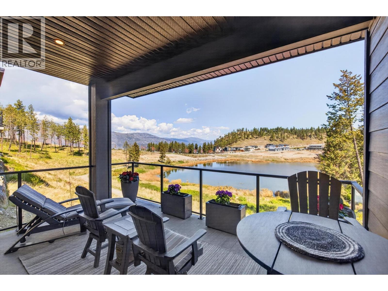 Upper Deck - 1936 Northern Flicker Court, Kelowna, BC - Outdoor With Body Of Water With Deck Patio Veranda With View With Exterior