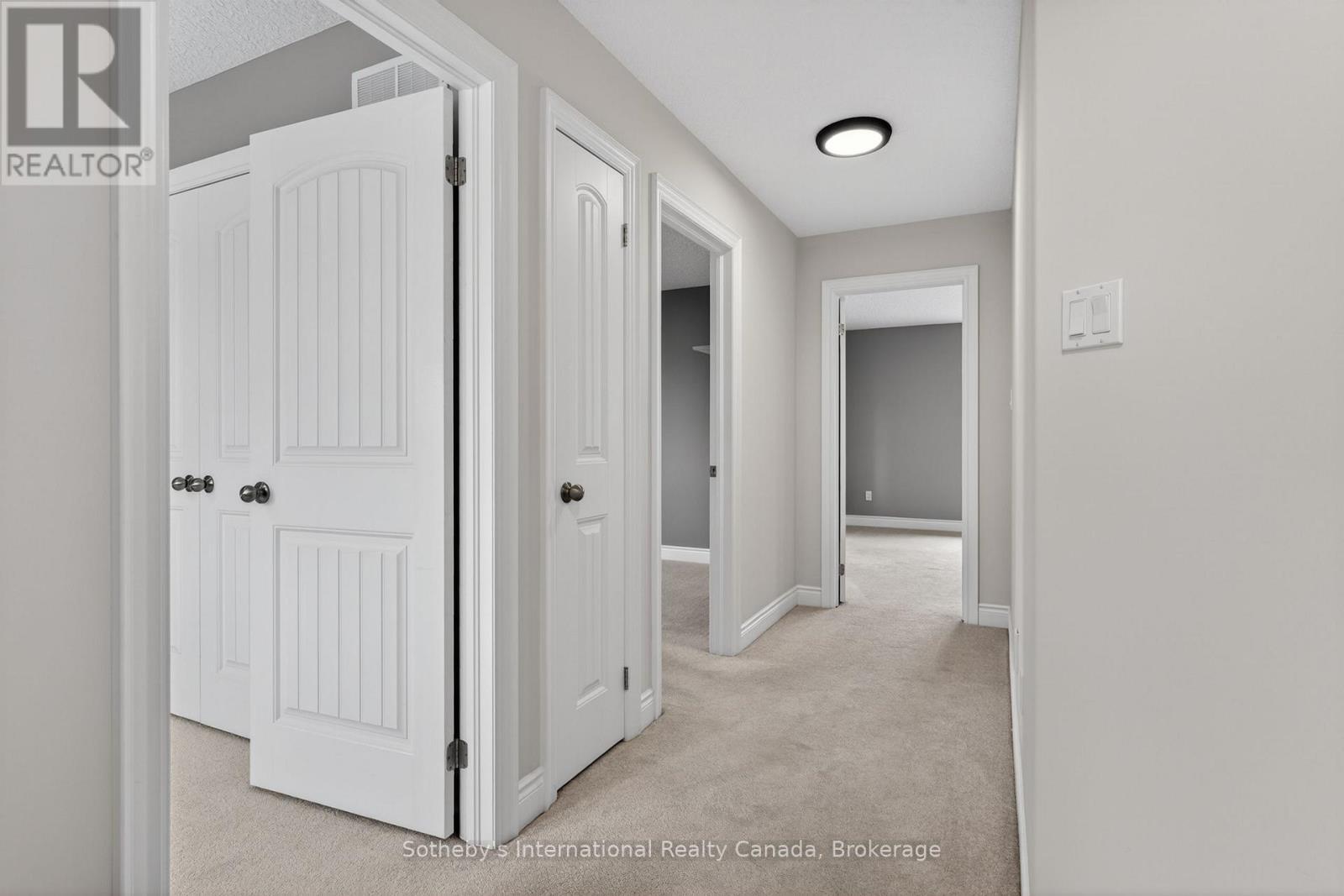 Upstairs Hallway - 19 Garbutt Crescent, Collingwood, ON - Indoor Photo Showing Other Room