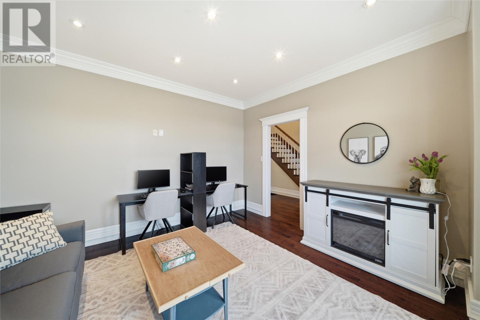 24 Pluto Street, St. John'S, NL - Indoor Photo Showing Living Room With Fireplace