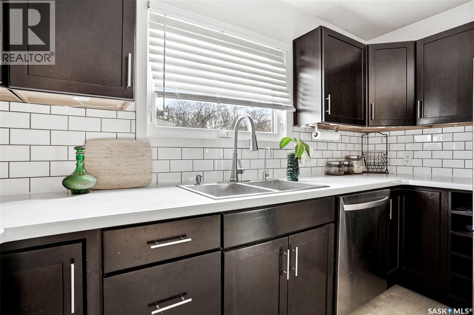 12 Fox Glove Crescent, Regina, SK - Indoor Photo Showing Kitchen With Double Sink