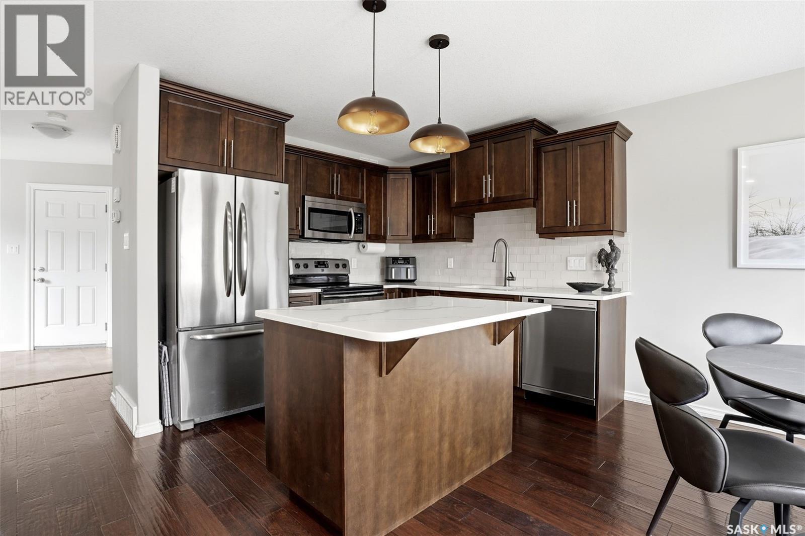 157 4100 Sandhill Crescent, Regina, SK - Indoor Photo Showing Kitchen With Stainless Steel Kitchen With Upgraded Kitchen