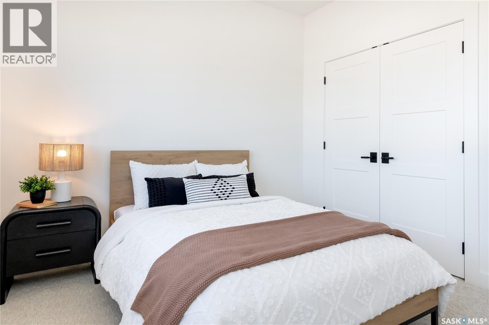 114 Cockcroft Manor, Saskatoon, SK - Indoor Photo Showing Bedroom