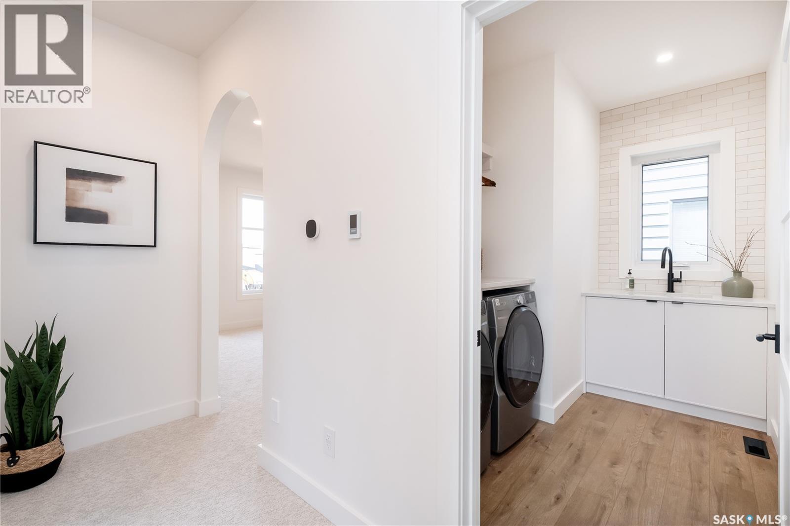 114 Cockcroft Manor, Saskatoon, SK - Indoor Photo Showing Laundry Room