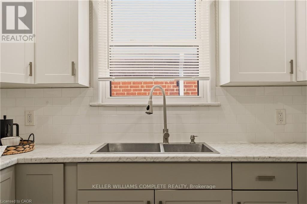 148 Huxley Avenue S, Hamilton, ON - Indoor Photo Showing Kitchen With Double Sink