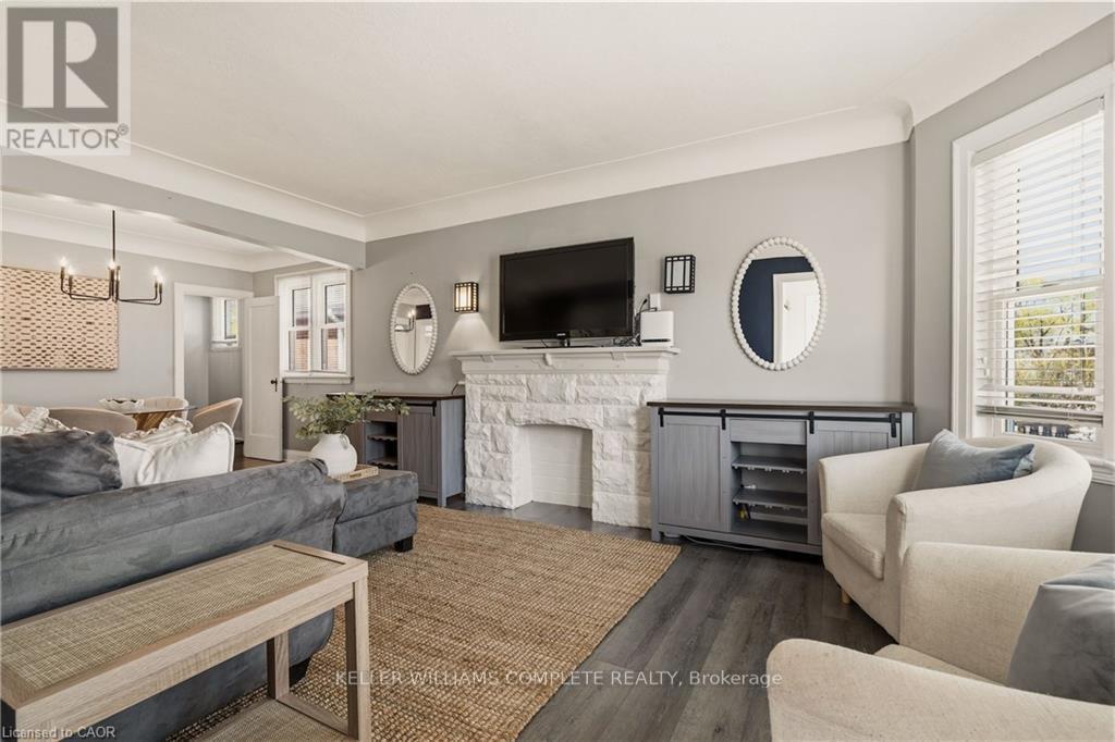 148 Huxley Avenue S, Hamilton, ON - Indoor Photo Showing Living Room With Fireplace