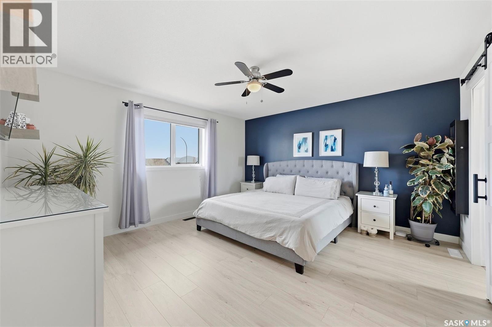 402 Crystal Bay, Warman, SK - Indoor Photo Showing Bedroom