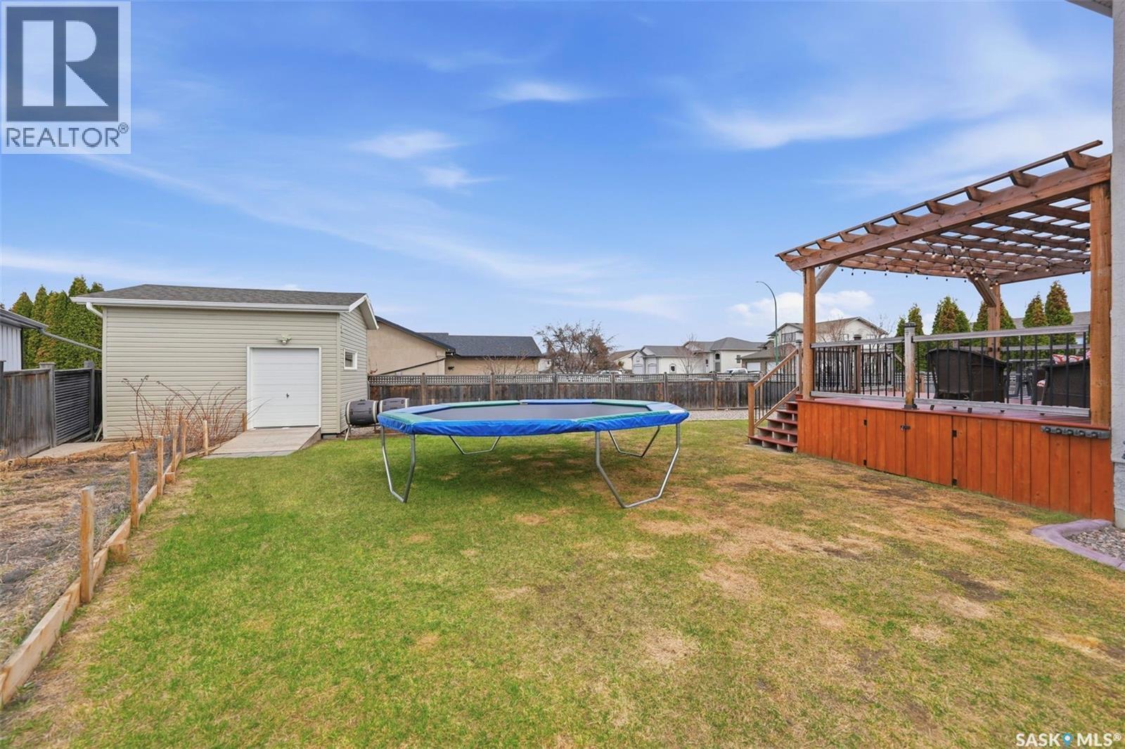 402 Crystal Bay, Warman, SK - Outdoor With Backyard