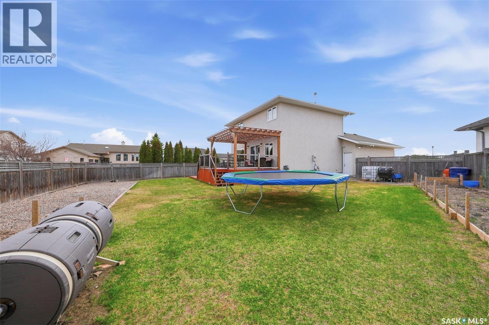 402 Crystal Bay, Warman, SK - Outdoor With Backyard