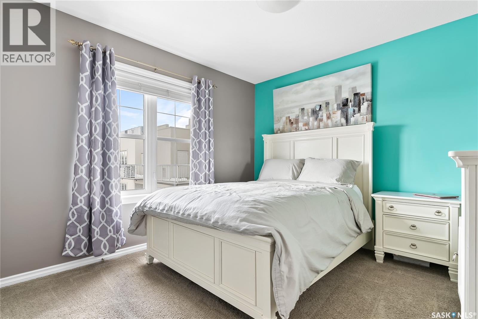 311 1715 Badham Boulevard, Regina, SK - Indoor Photo Showing Bedroom
