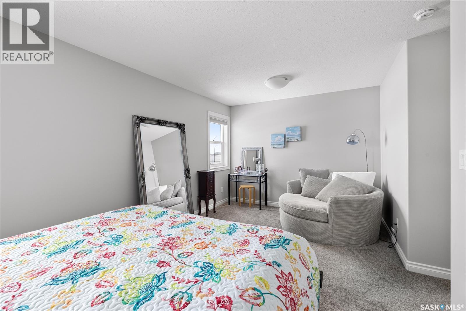 145 Plains Circle, Pilot Butte, SK - Indoor Photo Showing Bedroom