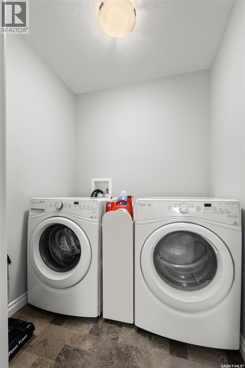145 Plains Circle, Pilot Butte, SK - Indoor Photo Showing Laundry Room