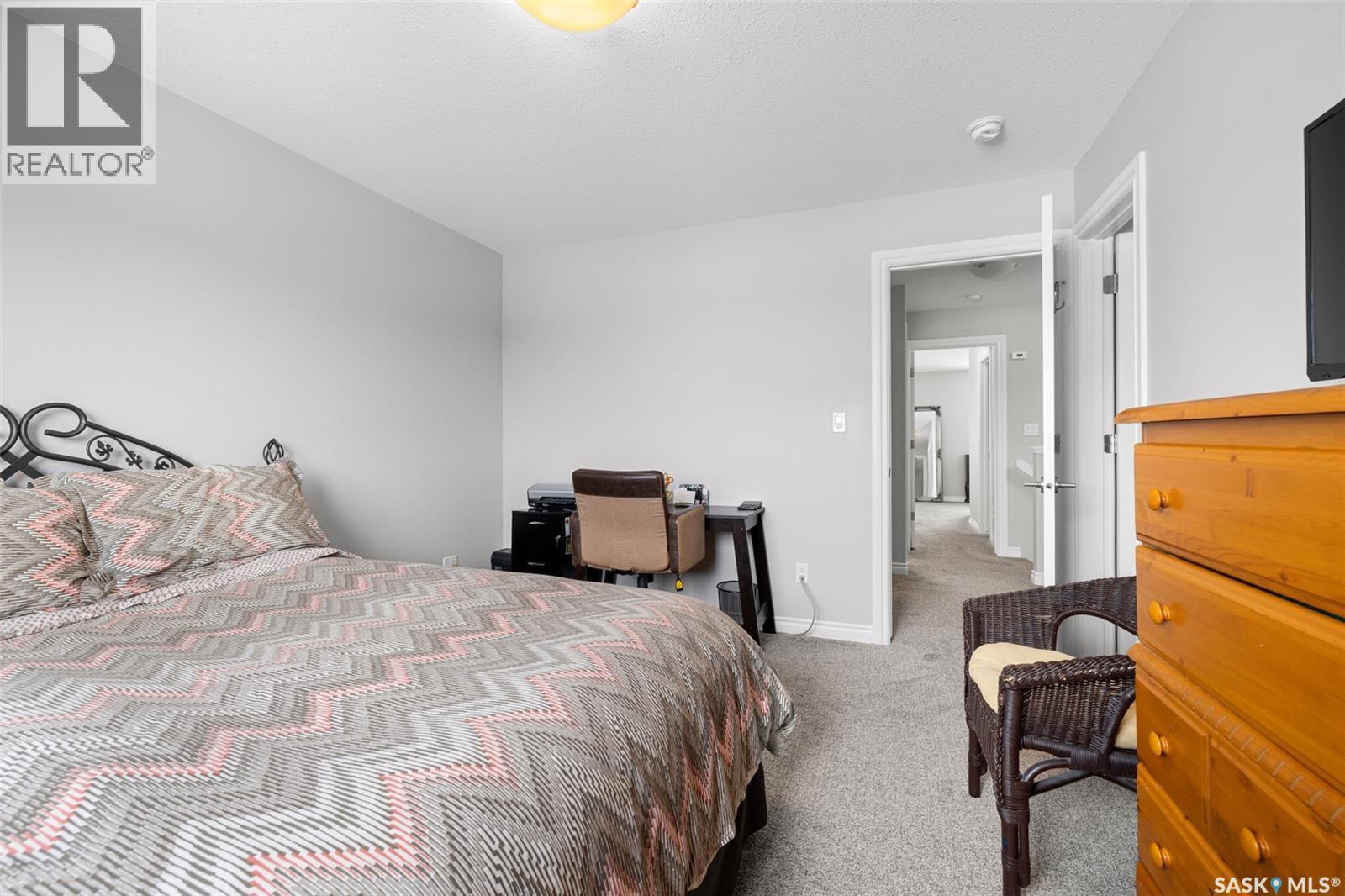 145 Plains Circle, Pilot Butte, SK - Indoor Photo Showing Bedroom
