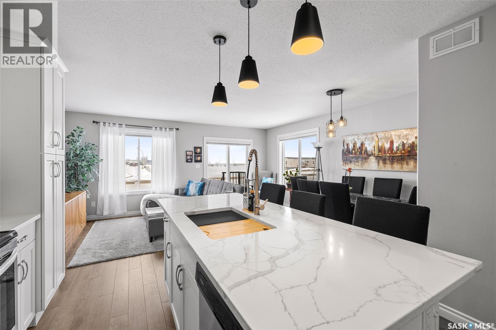 145 Plains Circle, Pilot Butte, SK - Indoor Photo Showing Kitchen With Upgraded Kitchen