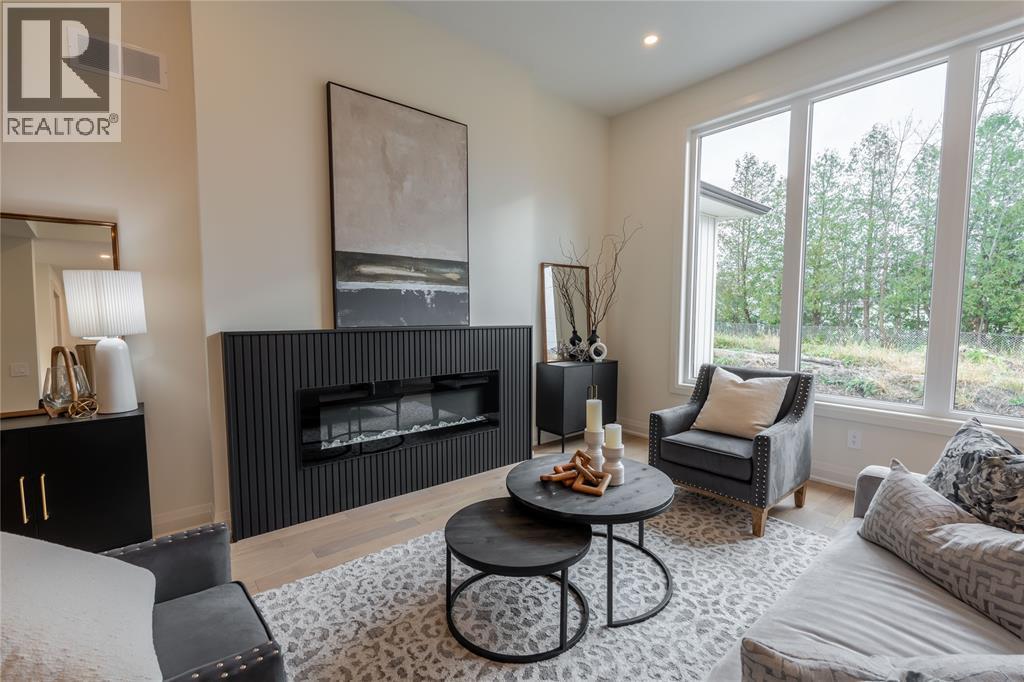 103 Sutherland Drive, St Clair, ON - Indoor Photo Showing Living Room With Fireplace
