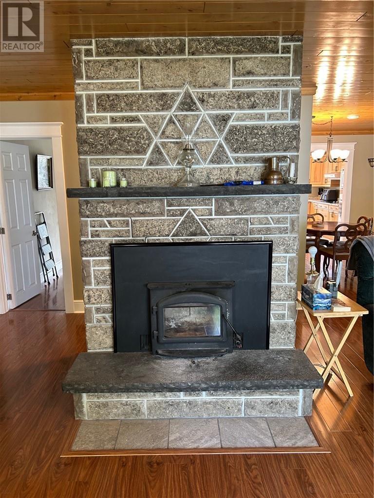 29 Sidney Lane, Mindemoya, ON - Indoor Photo Showing Living Room With Fireplace