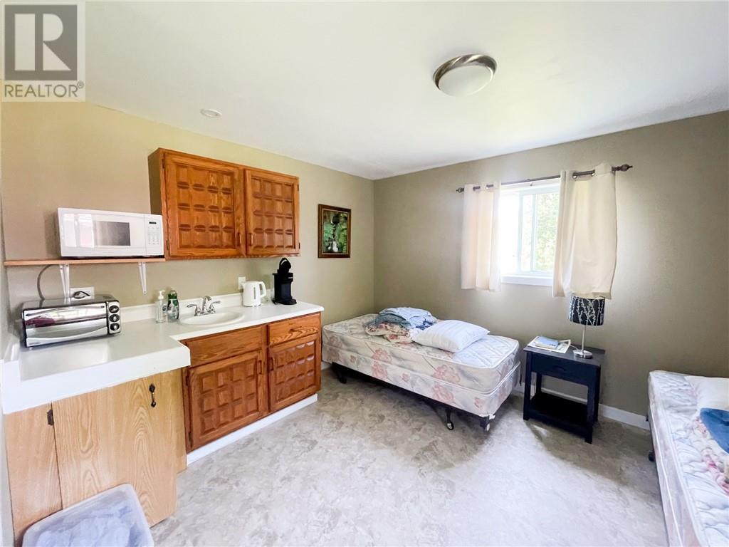 29 Sidney Lane, Mindemoya, ON - Indoor Photo Showing Bedroom