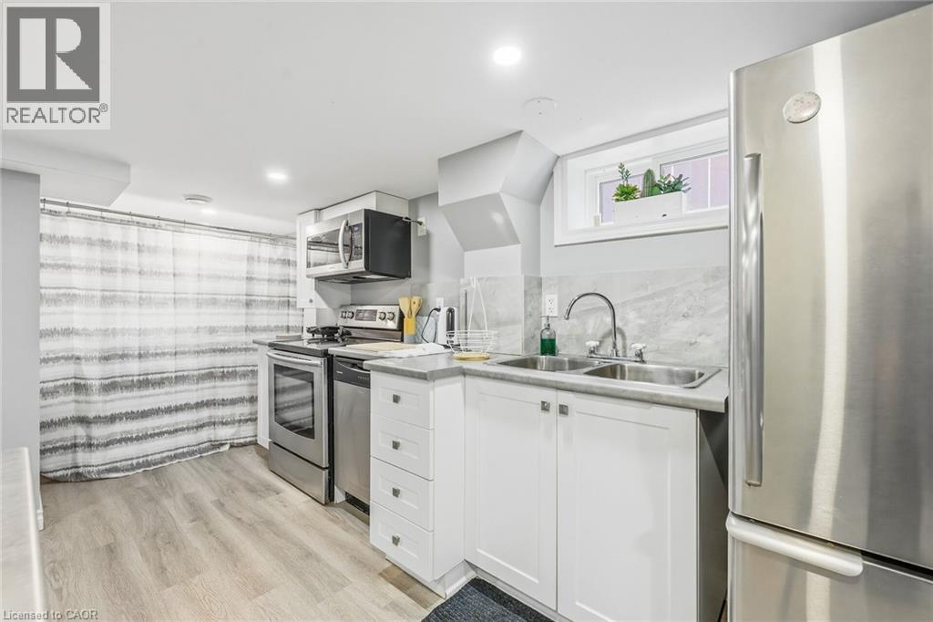 624 Upper Ottawa Street, Hamilton, ON - Indoor Photo Showing Kitchen With Double Sink