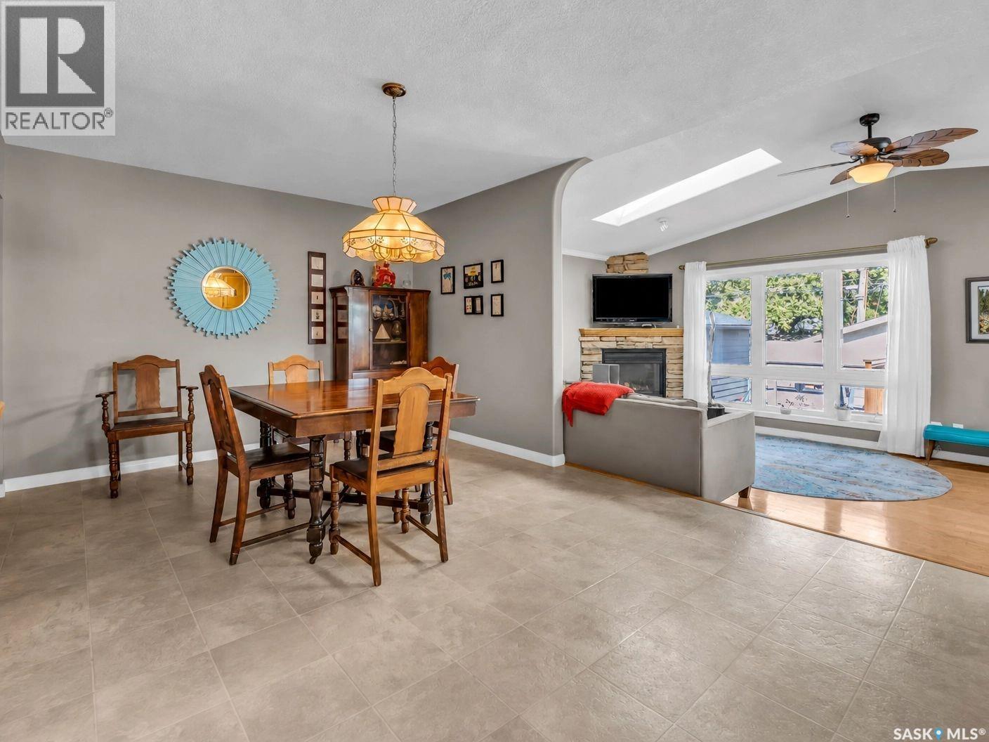 1534 9Th Avenue N, Saskatoon, SK - Indoor Photo Showing Dining Room With Fireplace
