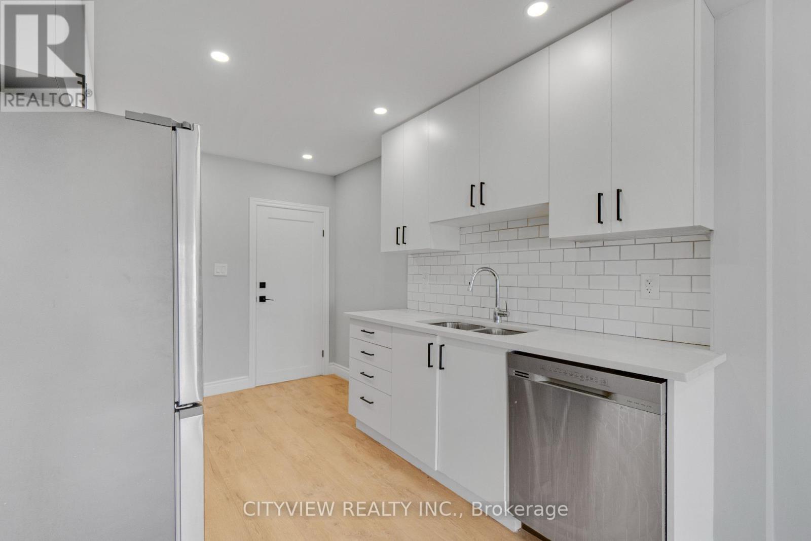 76 Stapleton Avenue, Hamilton, ON - Indoor Photo Showing Kitchen With Double Sink