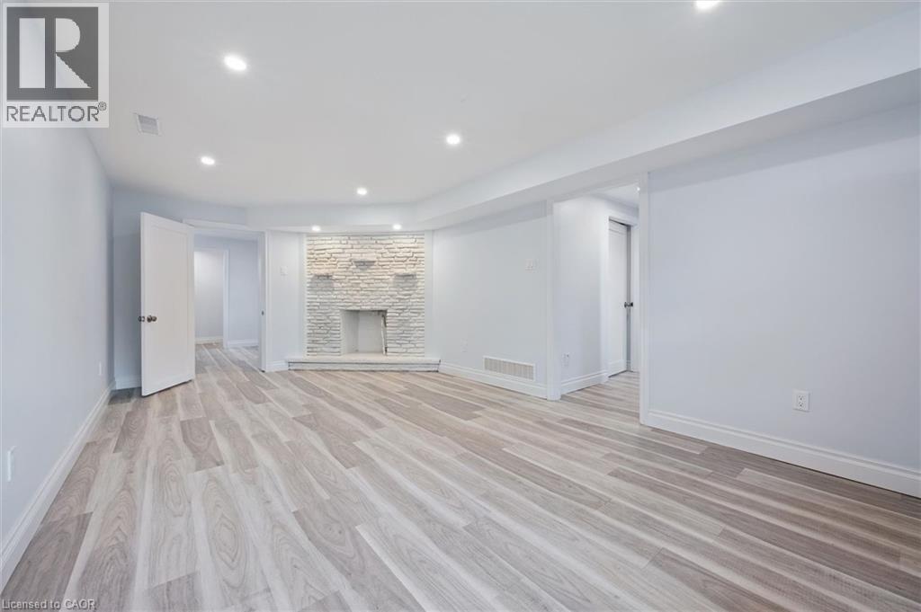 176 Woodville Place, Waterloo, ON - Indoor Photo Showing Other Room With Fireplace