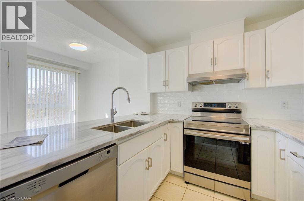 142 York Road Unit# 9, Guelph, ON - Indoor Photo Showing Kitchen With Stainless Steel Kitchen With Double Sink With Upgraded Kitchen
