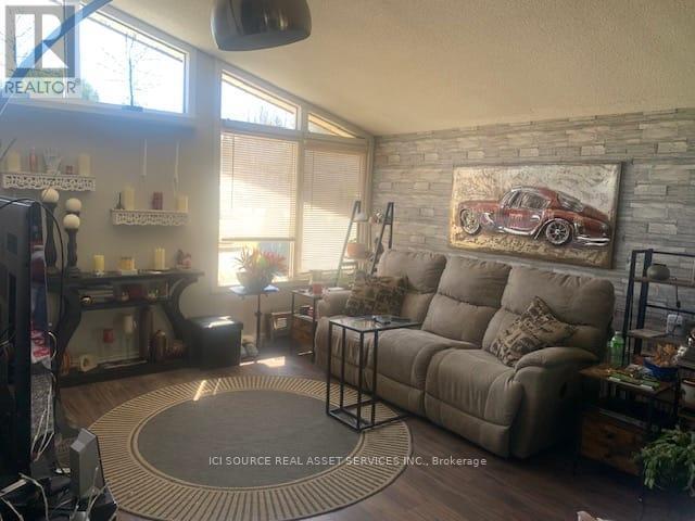 4 Kelvin Crescent, Deep River, ON - Indoor Photo Showing Living Room With Fireplace